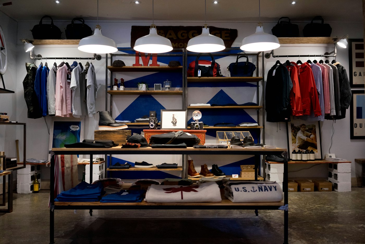 Retail interior with clothing displays and clear floor space